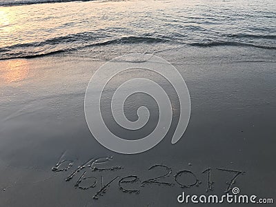 Say goodbye to year 2017 when sunrise on the beach Stock Photo